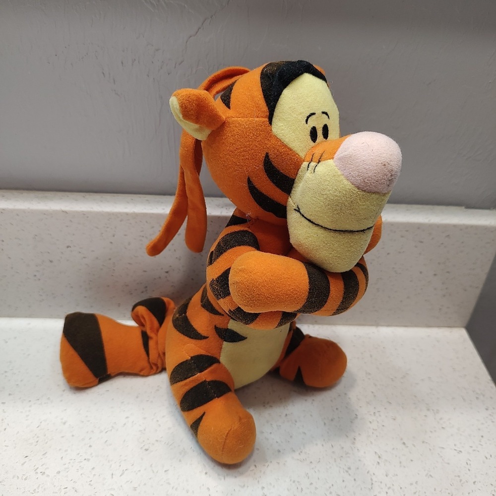 The First Years Disney Winnie the Pooh Tigger Musical Plush Pull Toy for Crib